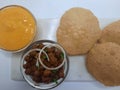 Alphonso Mango pulp with fried poori and channa Royalty Free Stock Photo