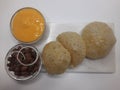 Alphonso Mango pulp with fried poori and channa Royalty Free Stock Photo