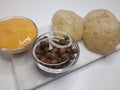 Alphonso Mango pulp with fried poori and channa Royalty Free Stock Photo