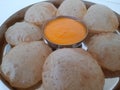 Alphonso Mango pulp with fried poori