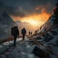 Alpine adventure Backpackers walking in snowy mountains during sunset Royalty Free Stock Photo