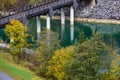Alpine autumn .river and bridge view