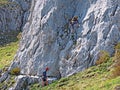 Alpine climbers on the cliffs of the Pilatus mountain range in the Emmental Alps - Canton of Obwalden, Switzerland