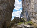 Alpine climbers on the Ebenalp mountain cliffs in the Appenzellerland region and Alpstein mountain range