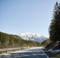 Alpine country road in the Austrian Alps - Stock Photo Royalty Free Stock Photo