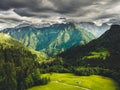 Alpine countryside landscape with high mountains. Kamnik Savinja Alps, Logar valley, Slovenia, Europe. Royalty Free Stock Photo