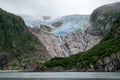 Alpine Glacier hanging glacier above the water in Kenai Fjords National Park in Alaska