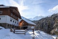 Alpine guest house Bergheim Fotsch and mountain panorama with snow in winter in Stubai Alps