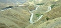 Alpine highway winding highway, passing through the peaks and spurs of the Atlas Mountains in Morocco