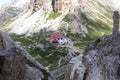 Alpine hut Dreizinnenhutte and rock Frankfurter Wurstel in Sexten Dolomites, South Tyrol Royalty Free Stock Photo