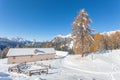Alpine hut in front of an awesome winter scenery, Val Fiorentina, Dolomites Royalty Free Stock Photo
