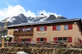 Alpine hut Rifugio Bonetta at gavia pass and mountain Monte Gavia Royalty Free Stock Photo