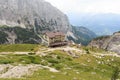 Alpine hut Rifugio Brentei and mountain alps panorama in Brenta Dolomites, Italy