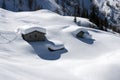 Alpine huts under snow Royalty Free Stock Photo