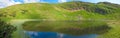 Alpine lake Nesamovyte on summer mountains Royalty Free Stock Photo