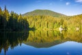 alpine lake synevyr in carpathian mountains in morning light Royalty Free Stock Photo