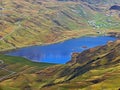 The alpine lake Tannensee or Tannen Lake in the Uri Alps mountain massif, Melchtal - Canton of Obwald, Switzerland Royalty Free Stock Photo