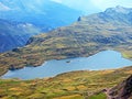 The alpine lake Tannensee or Tannen Lake in the Uri Alps mountain massif, Melchtal - Canton of Obwald, Switzerland Royalty Free Stock Photo