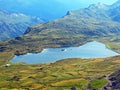 The alpine lake Tannensee or Tannen Lake in the Uri Alps mountain massif, Melchtal - Canton of Obwald, Switzerland Royalty Free Stock Photo