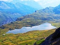 The alpine lake Tannensee or Tannen Lake in the Uri Alps mountain massif, Melchtal - Canton of Obwald, Switzerland Royalty Free Stock Photo