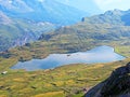 The alpine lake Tannensee or Tannen Lake in the Uri Alps mountain massif, Melchtal - Canton of Obwald, Switzerland Royalty Free Stock Photo