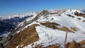 Alpine landscape at the end of winter. Blue sky, sunny day, spring in the mountains is coming. Royalty Free Stock Photo