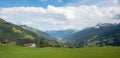 Alpine landscape with green meadow, tourist resort Pany, canton grisons switzerland Royalty Free Stock Photo