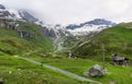 Alpine landscape with Matterhorn peak Cervino behind de clouds of the sky, Breuil-Cervinia, Aosta Valley, Italy Royalty Free Stock Photo