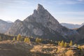 Alpine landscape, Mountains, fir trees and above all larches typical yellow autumn color. Southern Tyrol. Glamping luxury camping. Royalty Free Stock Photo