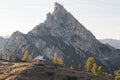 Alpine landscape, Mountains, fir trees and above all larches typical yellow autumn color. Southern Tyrol. Glamping luxury camping. Royalty Free Stock Photo