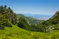 Alpine landscape panorama and city of Genoa in the background in Beigua National Geopark Royalty Free Stock Photo