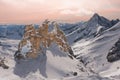 Alpine landscape with peaks covered by snow and clouds, beautiful colors at the top of a glacier. Royalty Free Stock Photo