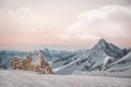 Alpine landscape with peaks covered by snow and clouds, beautiful colors at the top of a glacier Royalty Free Stock Photo