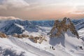 Alpine landscape with peaks covered by snow and clouds, beautiful colors at the top of a glacier Royalty Free Stock Photo