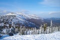 Alpine landscape with snow-covered spruce trees