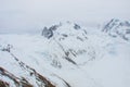 Snowy mountain ridge with sliding glacier in Swiss Alps