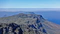 Alpine landscape of South Africa. On the flat summit of Table Mountain there are gray stones.