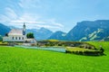 Alpine landscape with typical church Austrian Alps Royalty Free Stock Photo