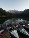Alpine mountain lake rowing boat landscape panorama at Laghi di Fusine Weissenfelser See Tarvisio Dolomites alps Italy Royalty Free Stock Photo