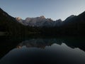 Alpine mountain lake landscape panorama reflection at Laghi di Fusine Weissenfelser See in Tarvisio Dolomites alps Italy Royalty Free Stock Photo