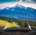 Alpine mountains on the pages of book