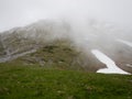 Alpine natural landscale in a foggy weather Royalty Free Stock Photo