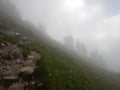 Alpine natural landscale in a foggy weather Royalty Free Stock Photo