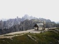 Alpine panorama of Cappella degli Alpini mountain chapel and Cadini di Misurina at Tre Cime Dolomites South Tyrol Italy Royalty Free Stock Photo