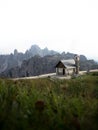 Alpine panorama of Cappella degli Alpini mountain chapel and Cadini di Misurina at Tre Cime Dolomites South Tyrol Italy Royalty Free Stock Photo