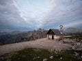 Alpine panorama of Cappella degli Alpini mountain chapel and Cadini di Misurina at Tre Cime Dolomites South Tyrol Italy Royalty Free Stock Photo