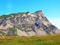 Alpine peaks Chli Haupt Murmelchopf and Haupt or BrÃÂ¼nighaupt Bruenighaupt oder Brunighaupt in the Uri Alps mountain massif Royalty Free Stock Photo