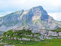 Alpine peaks Chli Haupt Murmelchopf and Haupt or BrÃÂ¼nighaupt Bruenighaupt oder Brunighaupt in the Uri Alps mountain massif Royalty Free Stock Photo