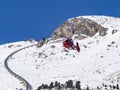 Alpine rescue helicopter in winter Royalty Free Stock Photo