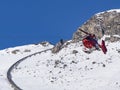 Alpine rescue helicopter in winter Royalty Free Stock Photo